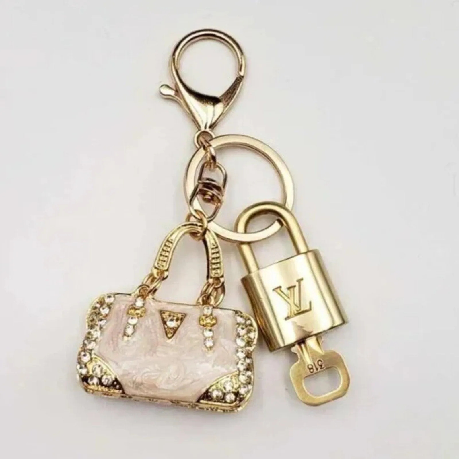 100% Auth Louis Vuitton Lock & Key with unbranded Bagcharm, Keycharm, Keychain