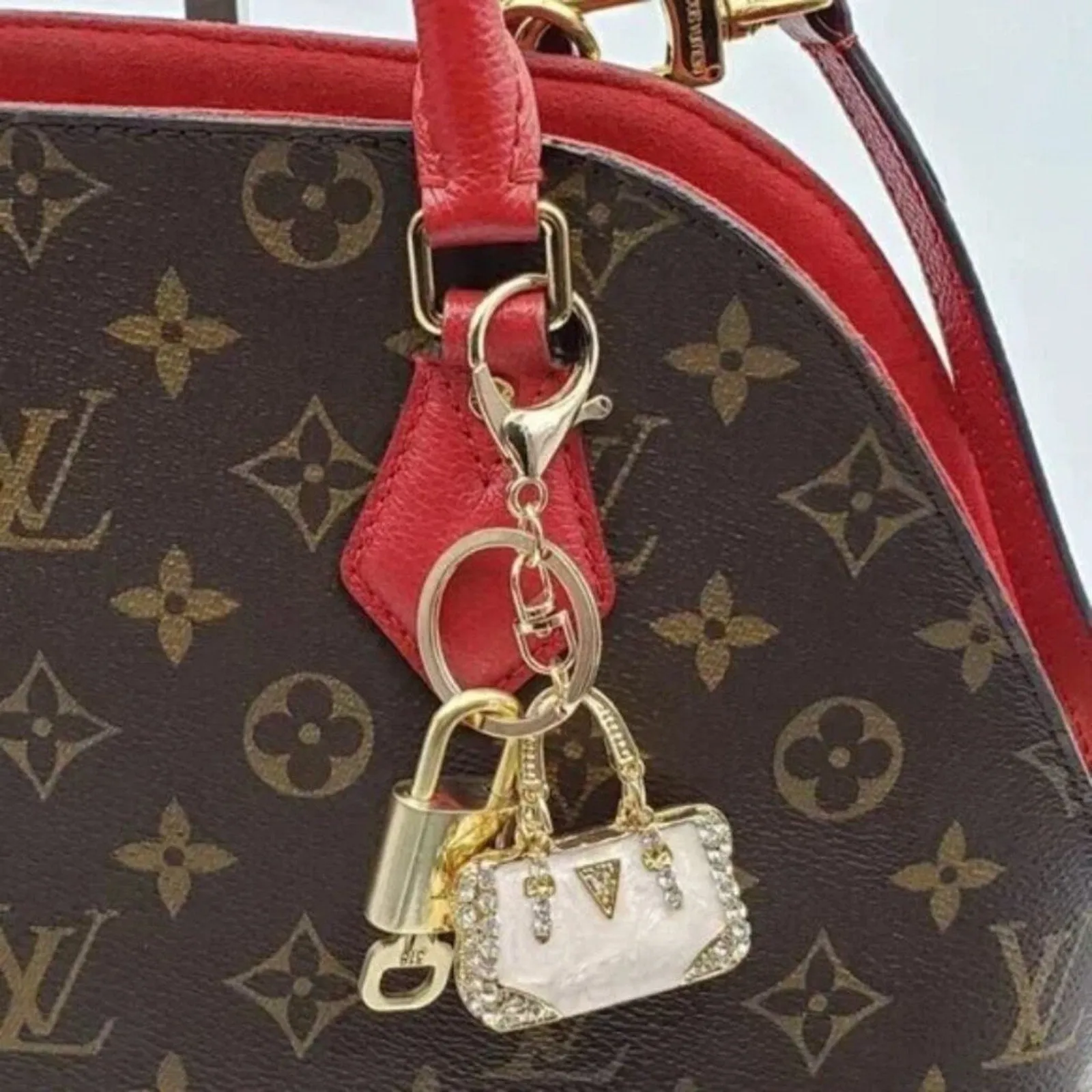 100% Auth Louis Vuitton Lock & Key with unbranded Bagcharm, Keycharm, Keychain