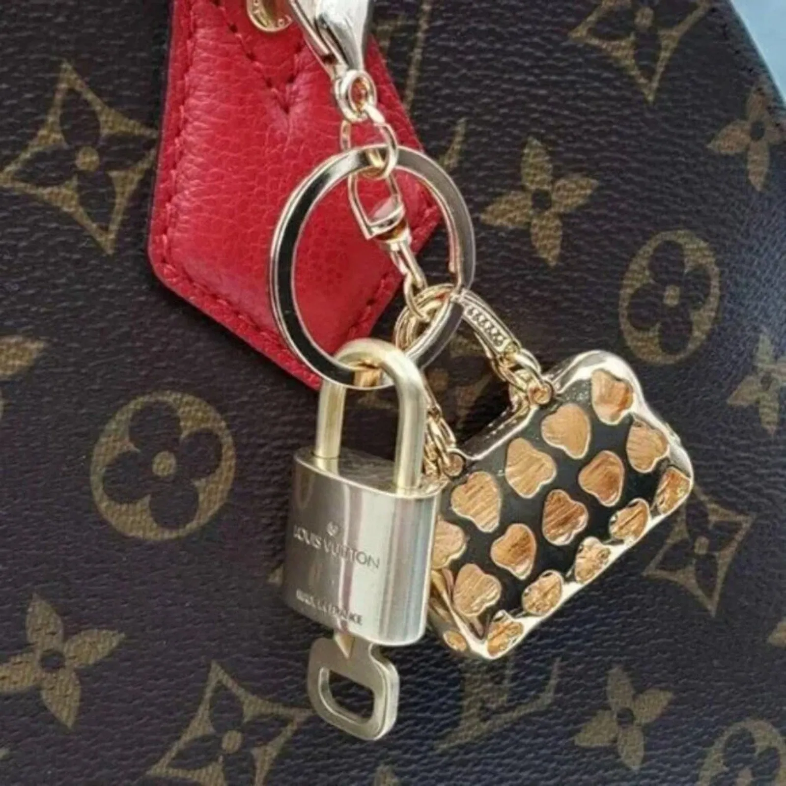 100% Auth Louis Vuitton Lock & Key with unbranded Bagcharm, Keycharm, Keychain