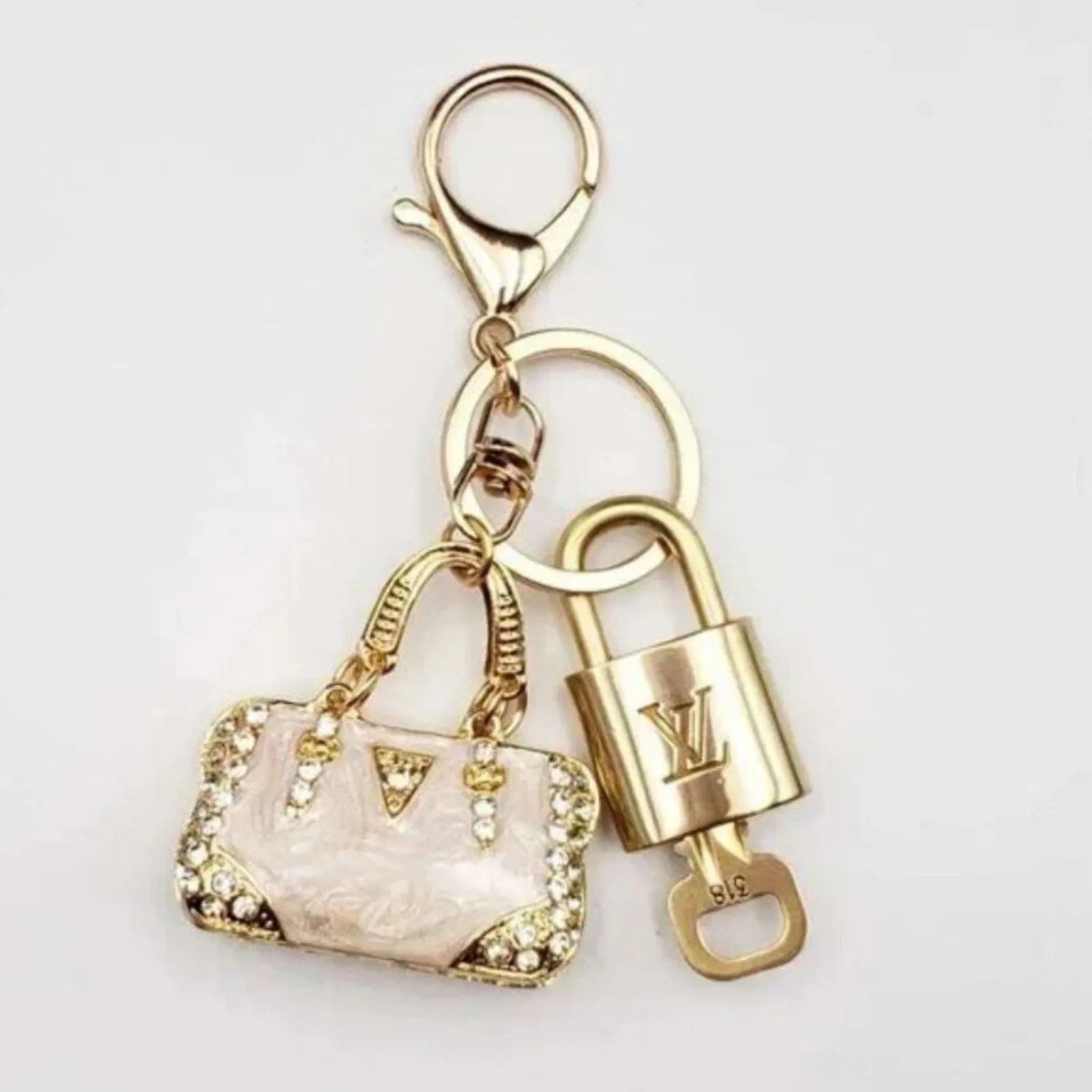 100% Auth Louis Vuitton Lock & Key with unbranded Bagcharm, Keycharm, Keychain