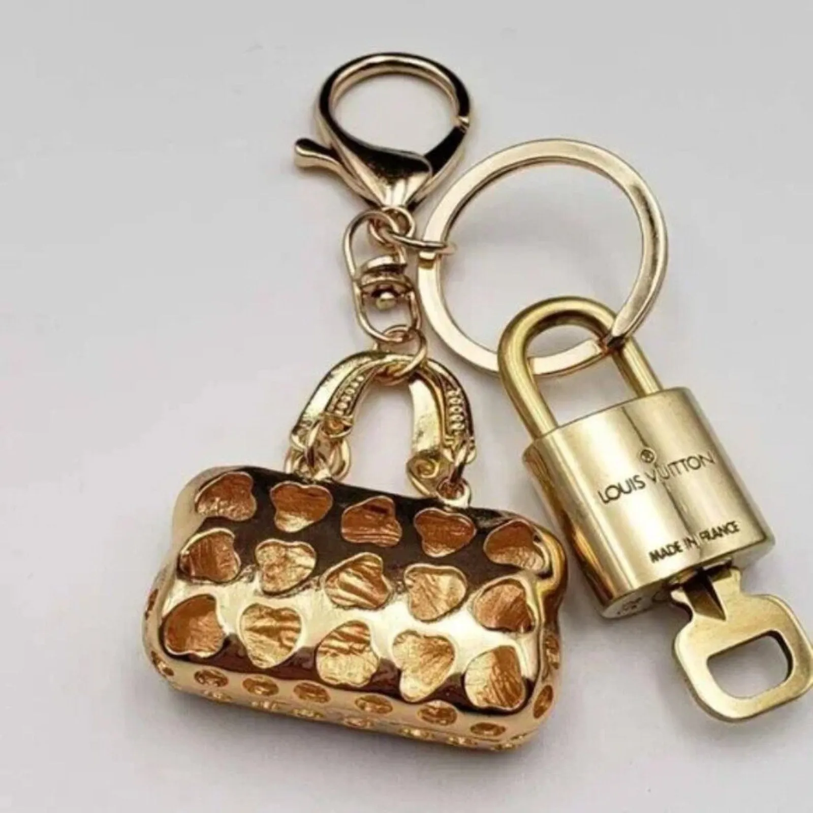 100% Auth Louis Vuitton Lock & Key with unbranded Bagcharm, Keycharm, Keychain