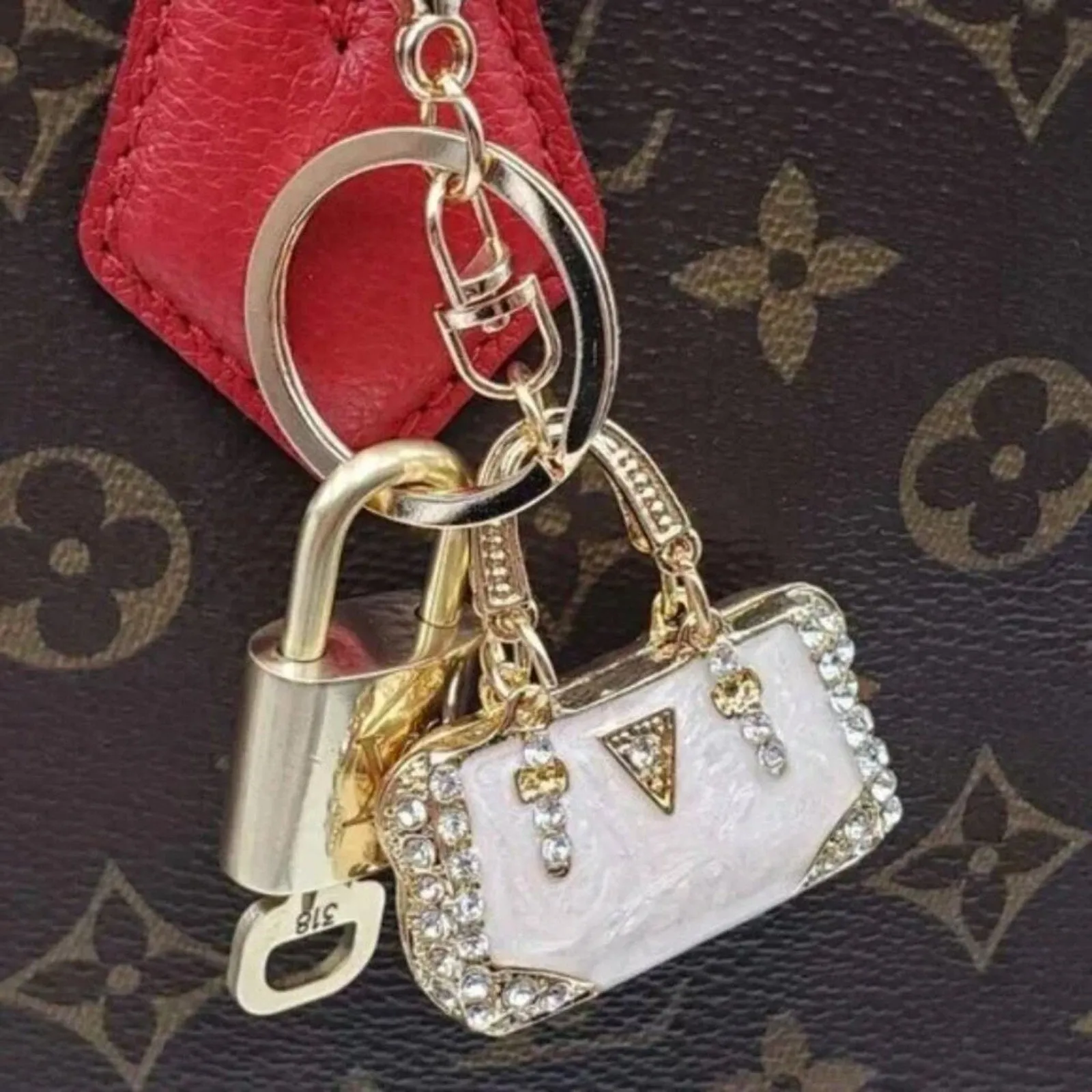 100% Auth Louis Vuitton Lock & Key with unbranded Bagcharm, Keycharm, Keychain