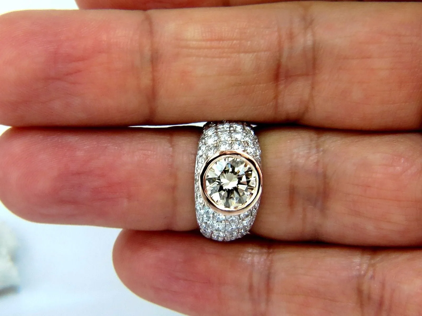 GIA Certified 3.08ct. Fancy light brown round cut diamond ring 14kt
