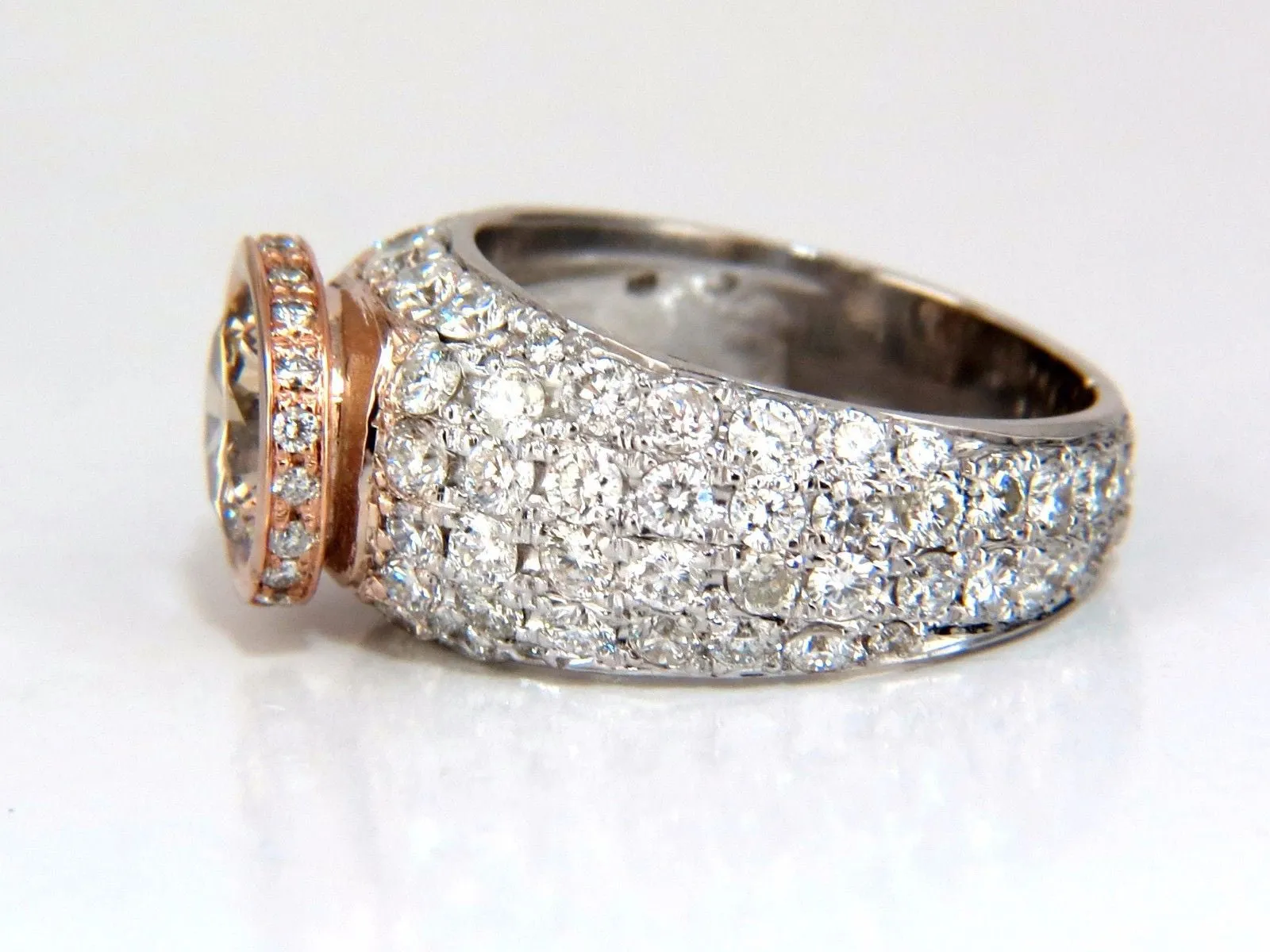 GIA Certified 3.08ct. Fancy light brown round cut diamond ring 14kt