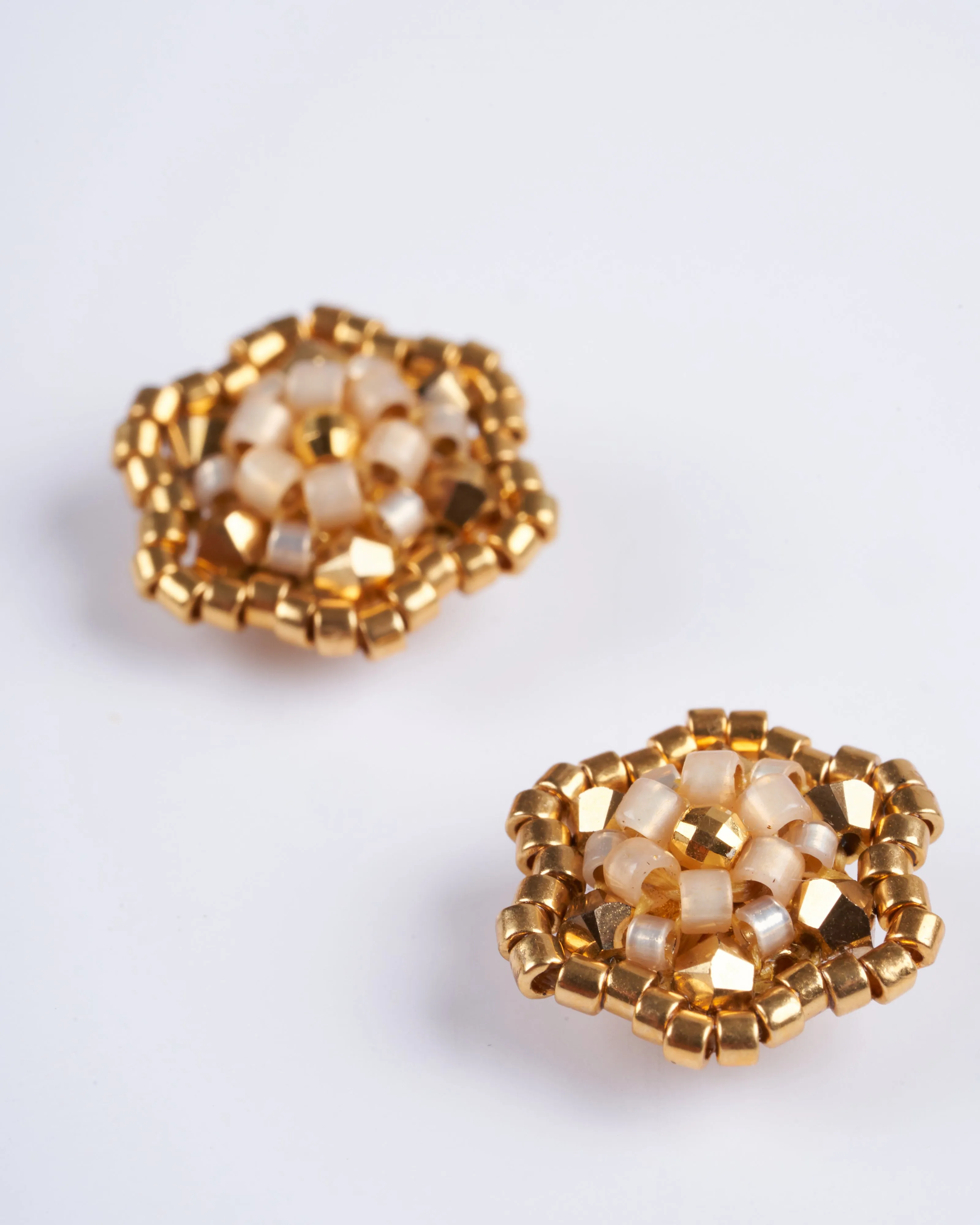 gold studded posts