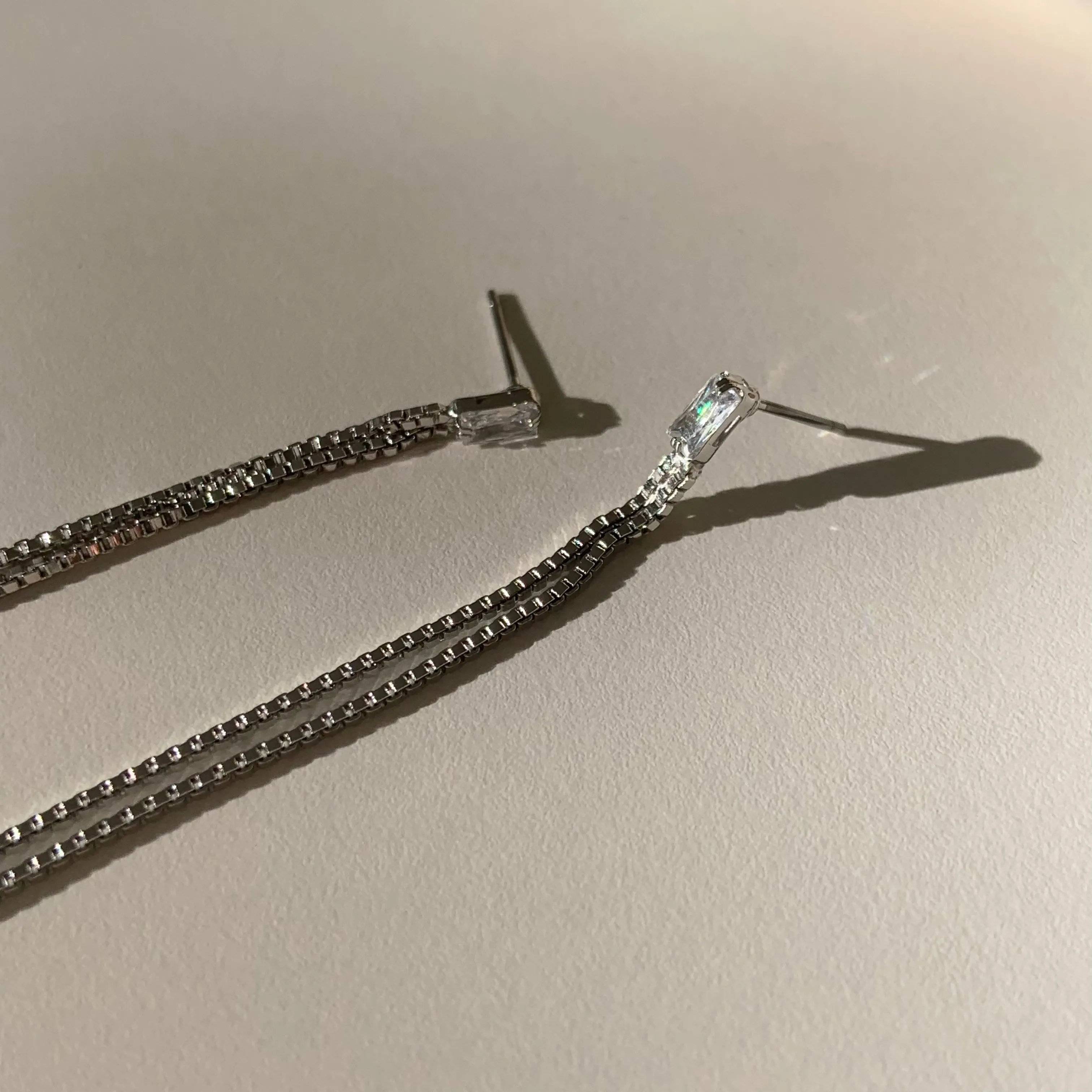 Penelope's Shiny Cubic Long Chain Earrings