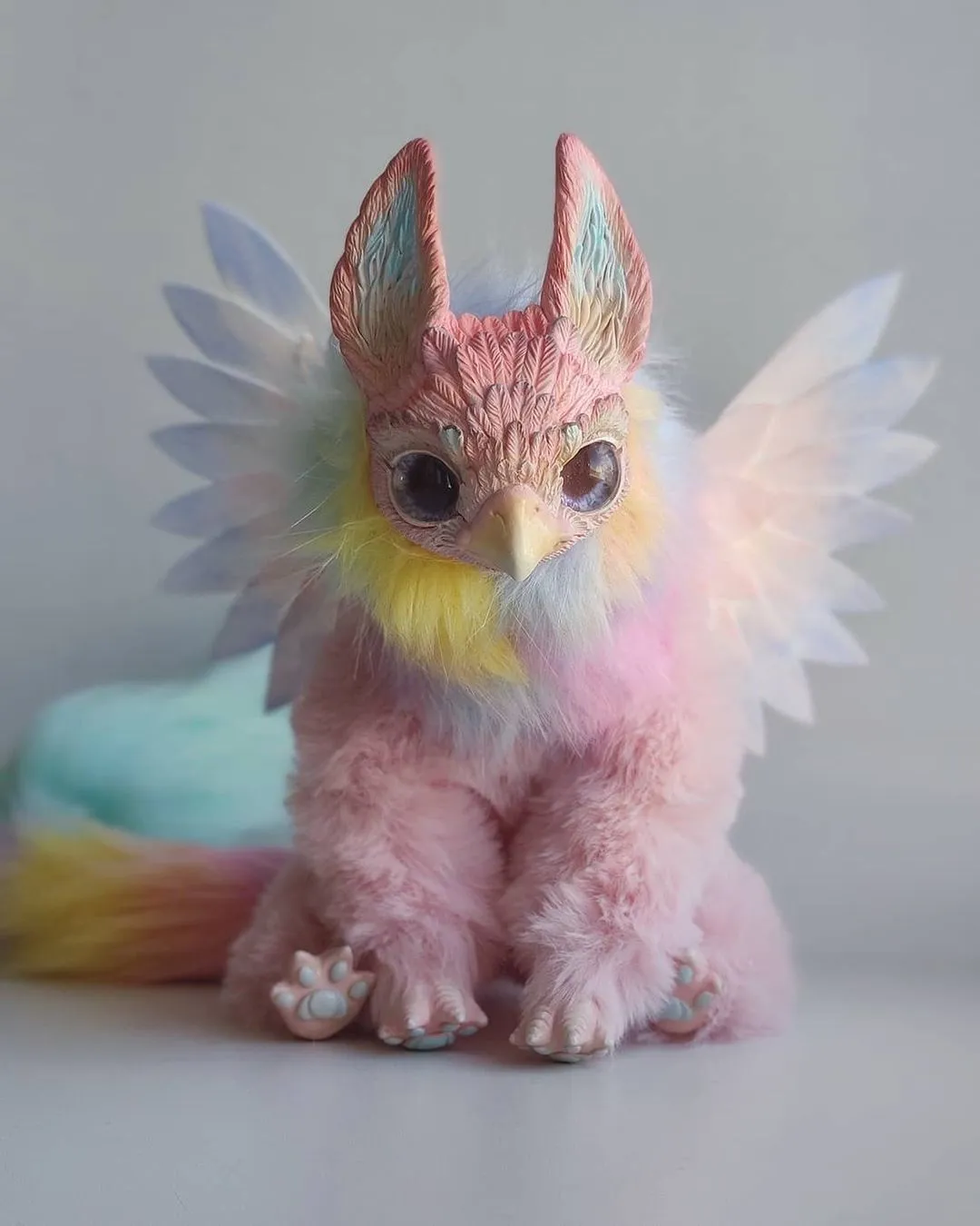 Pink pointy-eared griffin