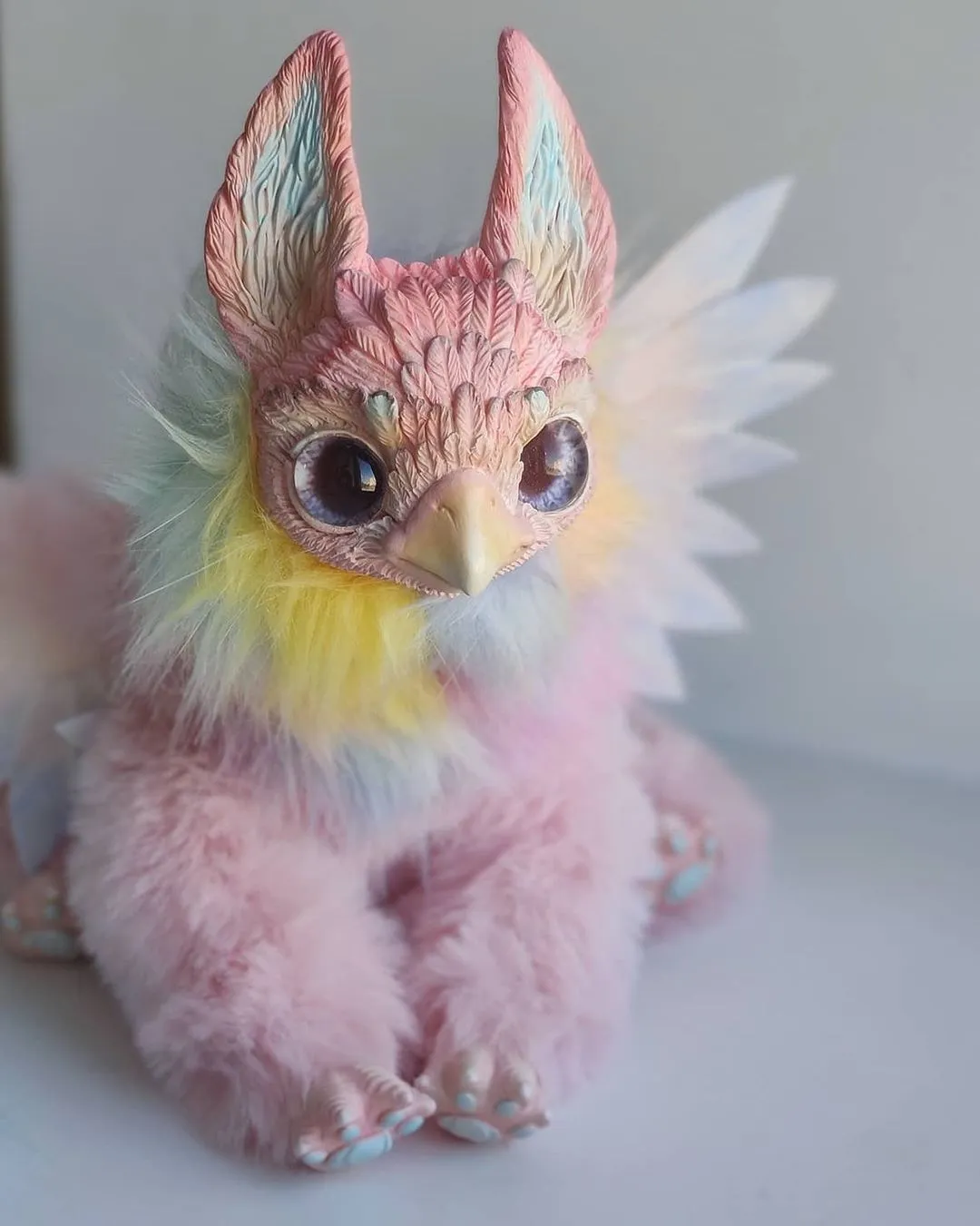 Pink pointy-eared griffin