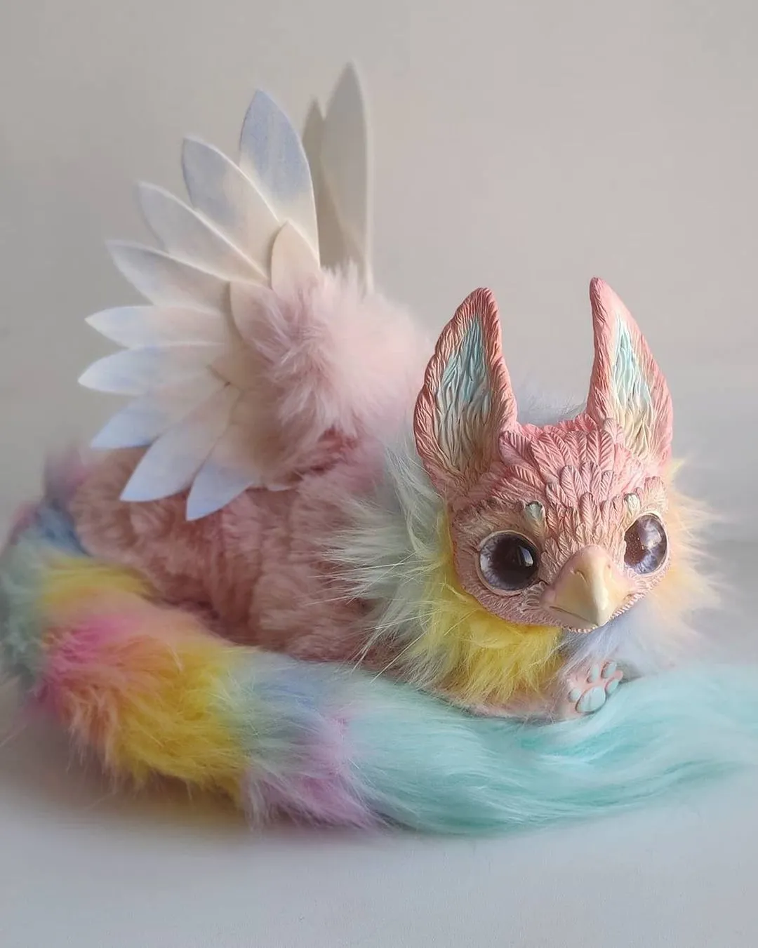 Pink pointy-eared griffin