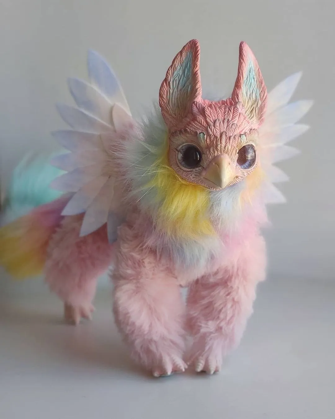 Pink pointy-eared griffin