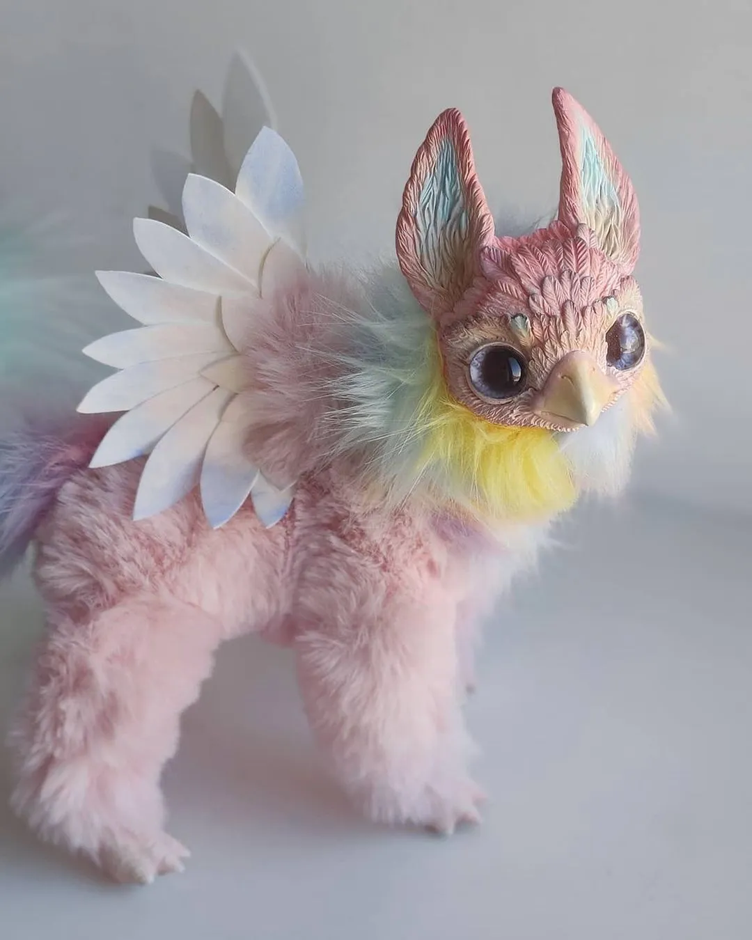 Pink pointy-eared griffin