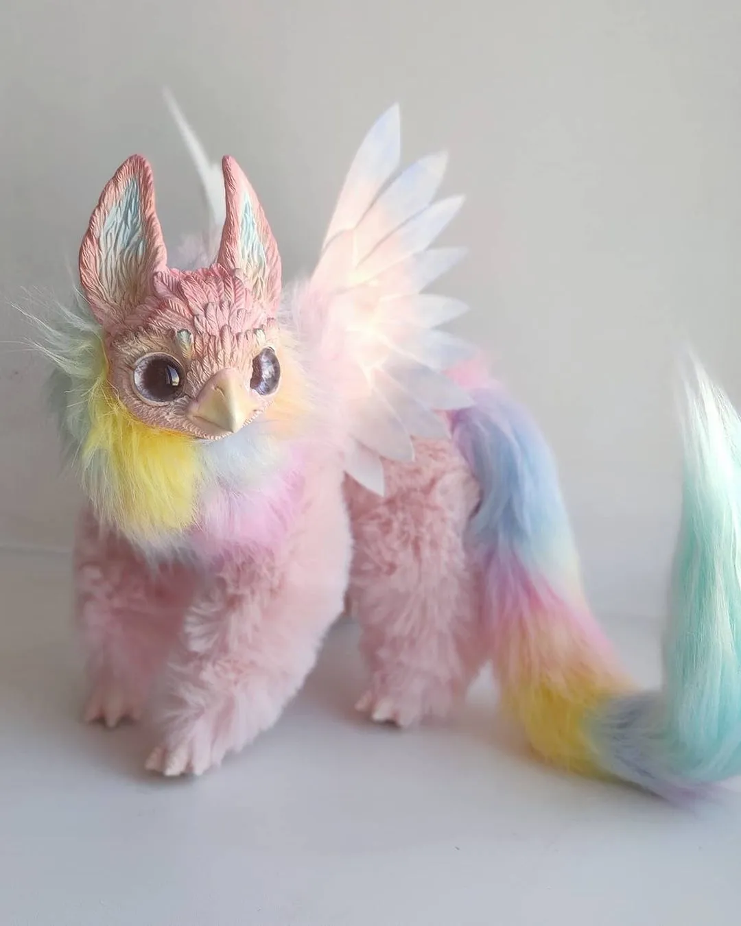 Pink pointy-eared griffin