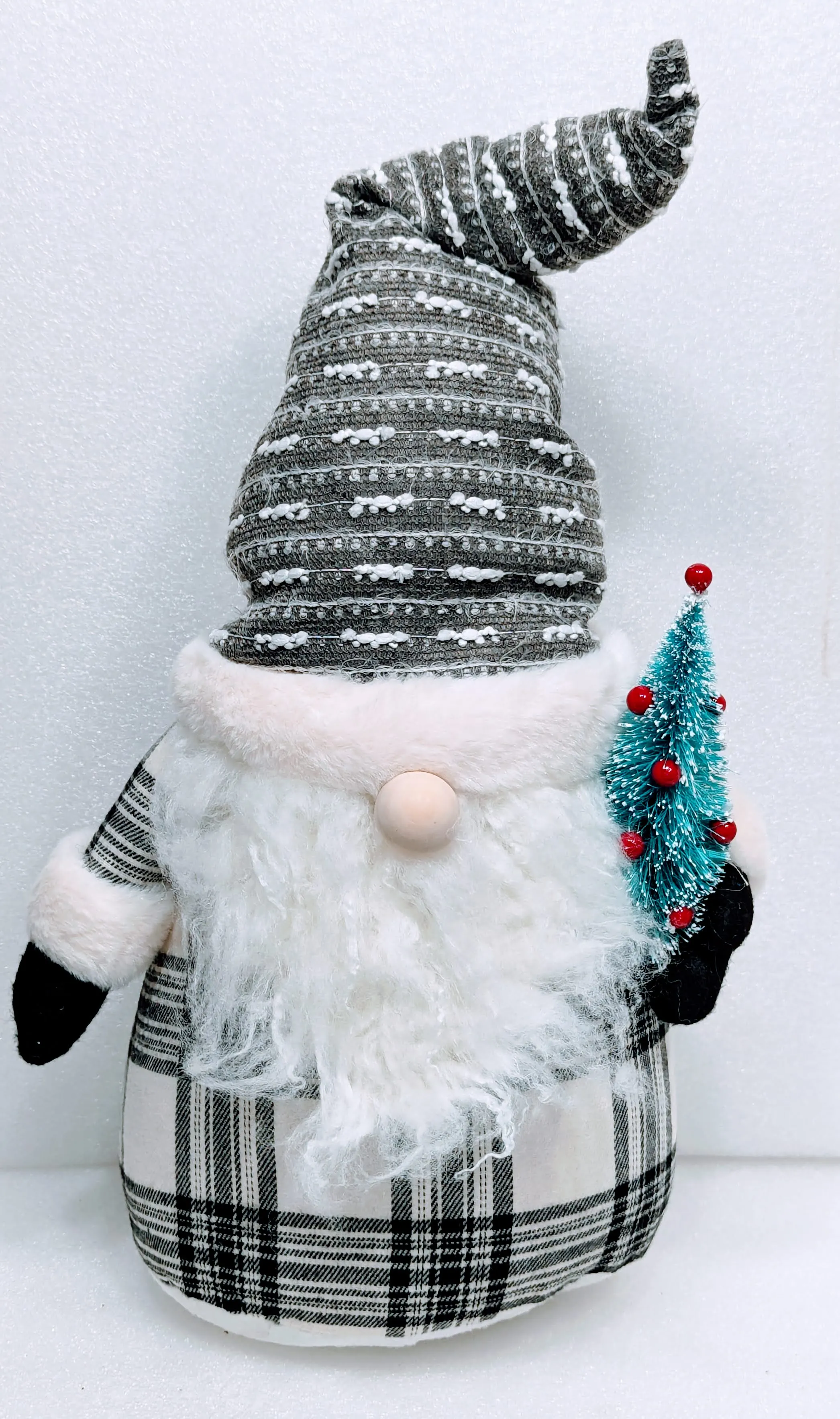 Plush Black/White Santa Holding Christmas Tree