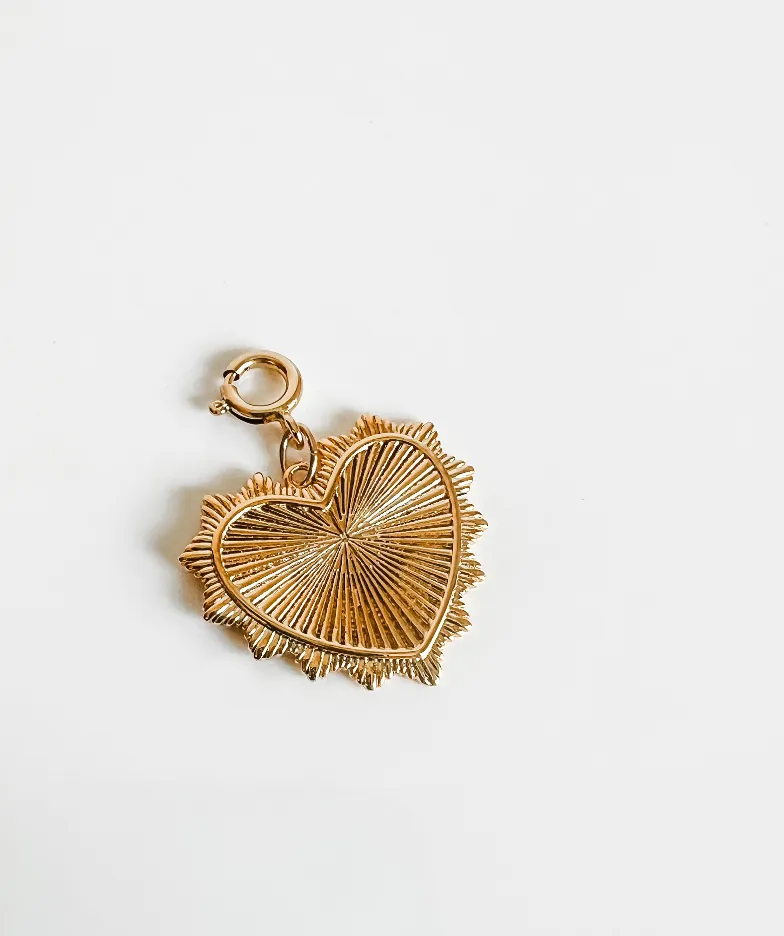 Sharp scalloped heart charm