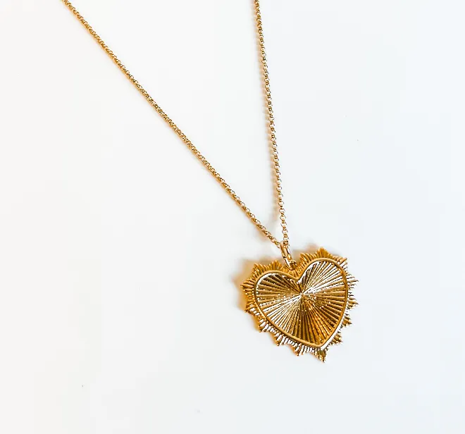 Sharp scalloped heart charm