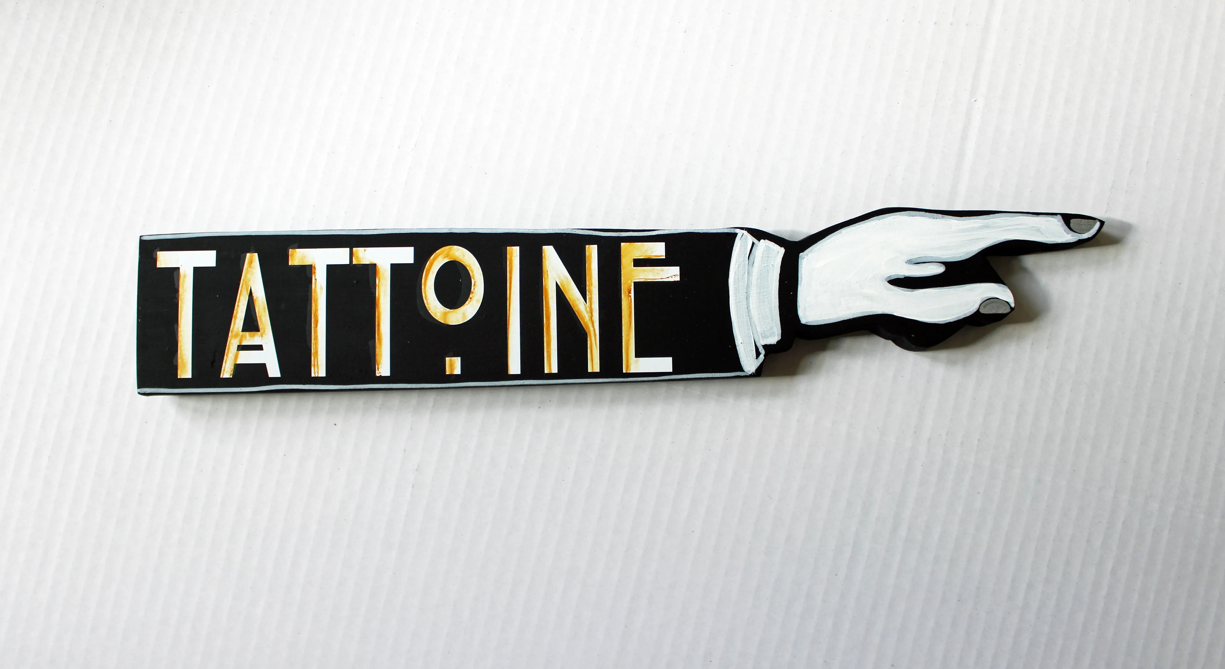 star planet Tattoine - wooden pointy sign
