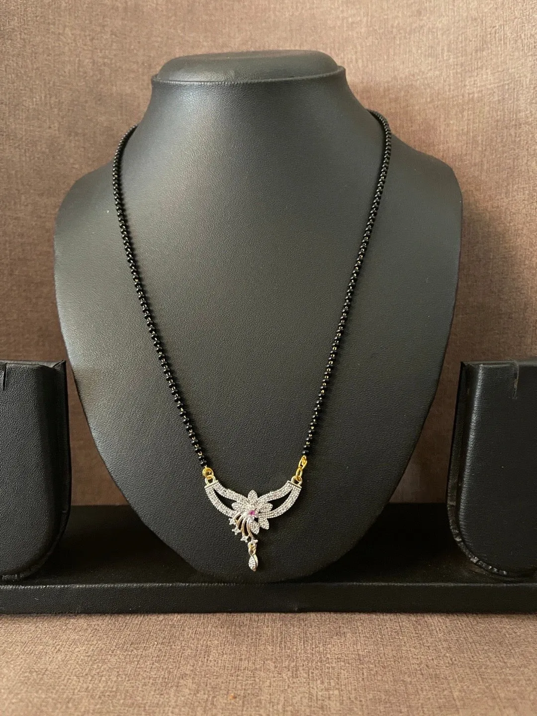 Trendy Short Mangalsutra Designs American Diamond Flower Pendant Simple Black Beads Chain